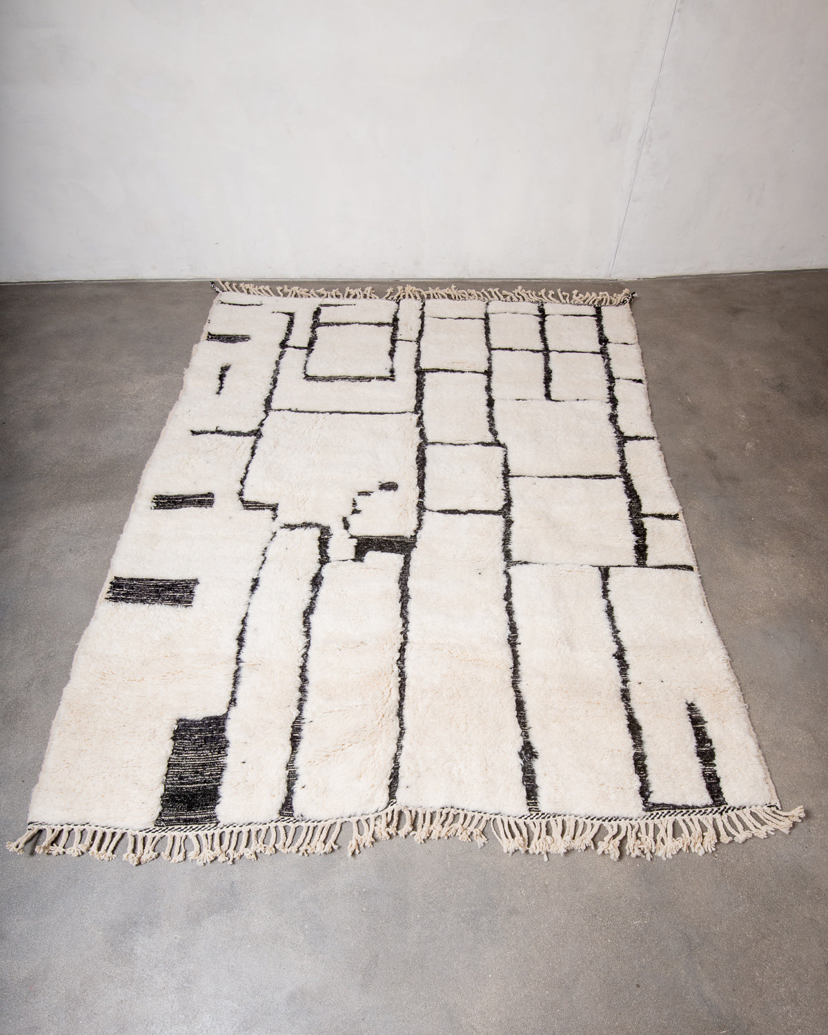 Modern, designer, handcrafted Berber rug from Morocco. Beniourain carpet with beautiful colours and patterns and fluffy wool texture.